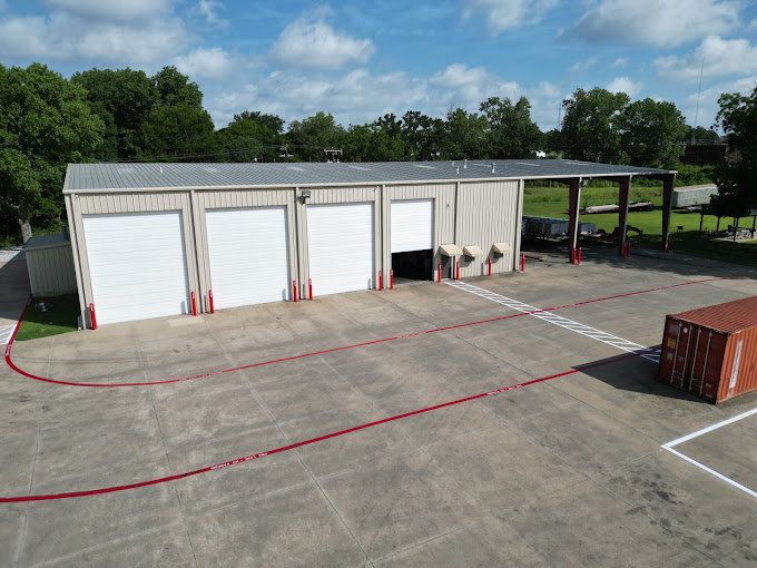 Bilbo maintenance shop with four overhead bay doors